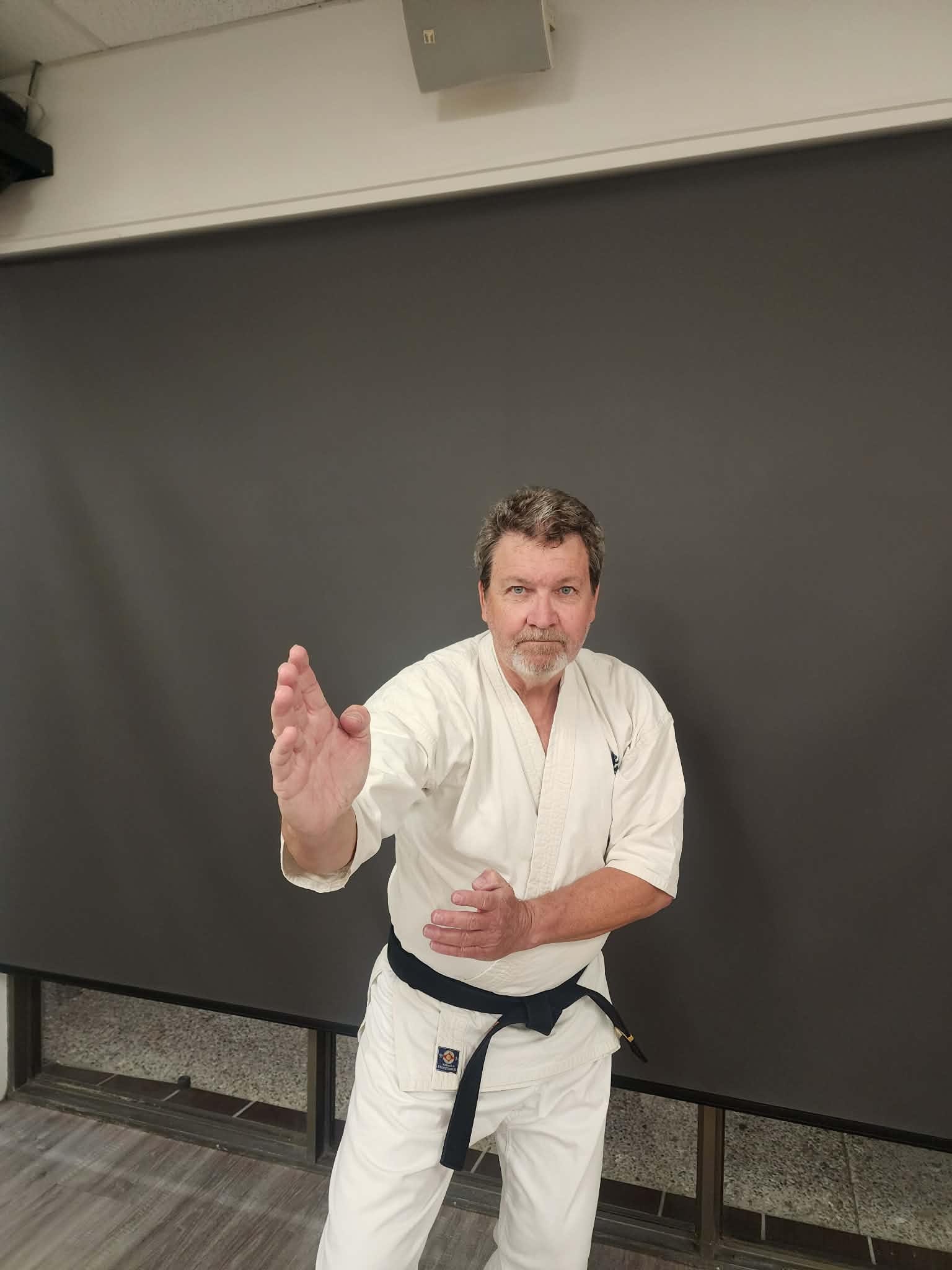 Senpai Kym Ross in karate gi